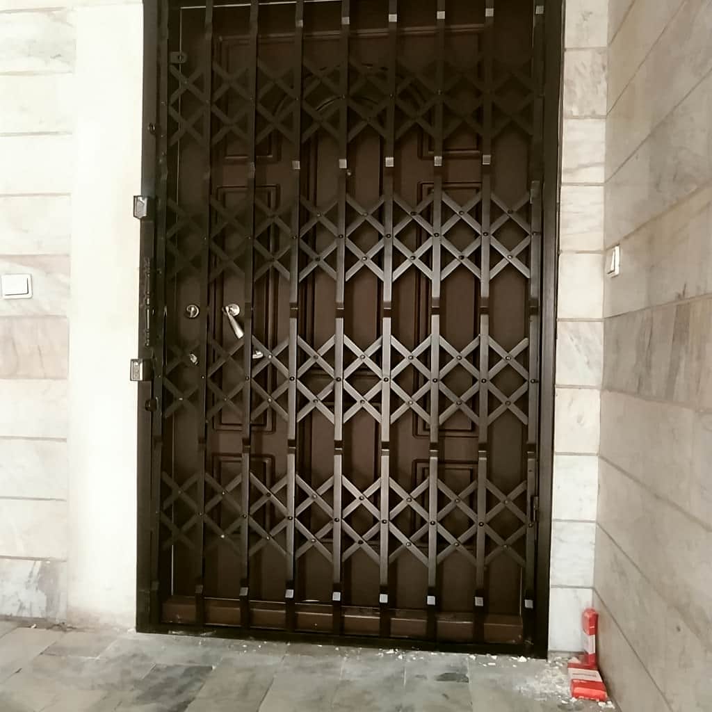 نصب درب آکاردئونی چهار گل در اشتهارد