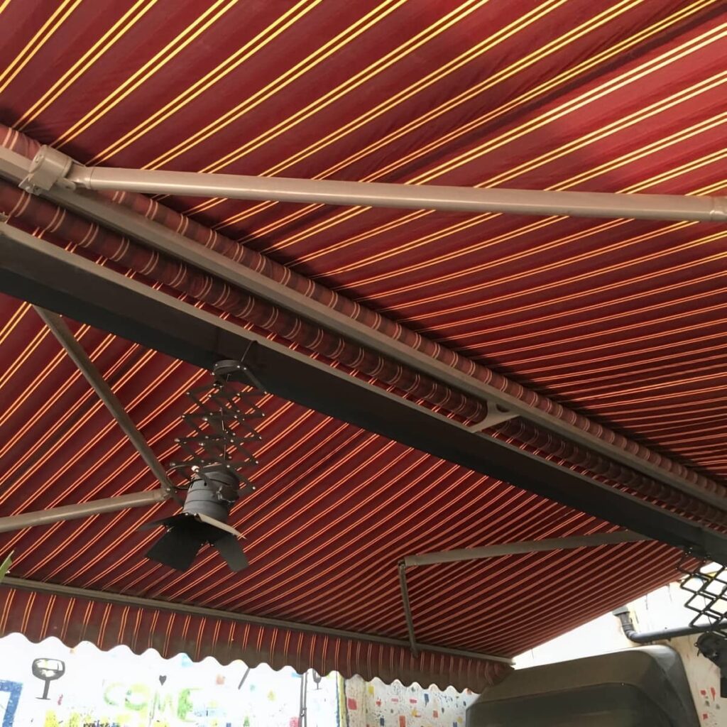 نصب سایبان برقی اتوماتیک پارچه ضدآب در سیرجان