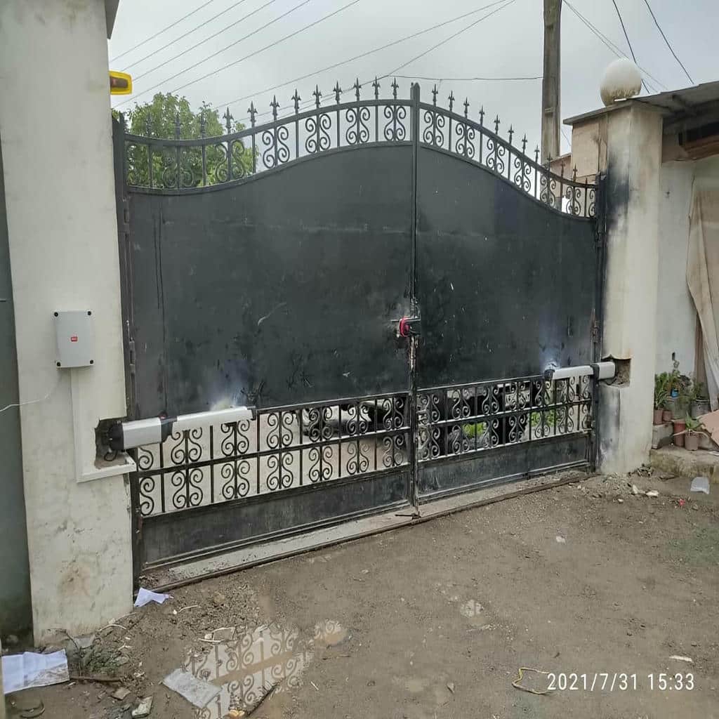 نصب جک درب برقی پارکینگ استاندارد در مهرشهر کرج