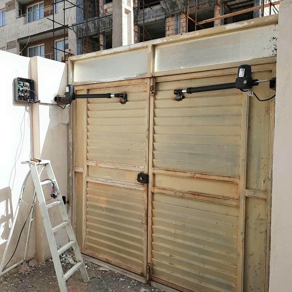 نصب جک درب برقی پارکینگ استاندارد در کمال شهر