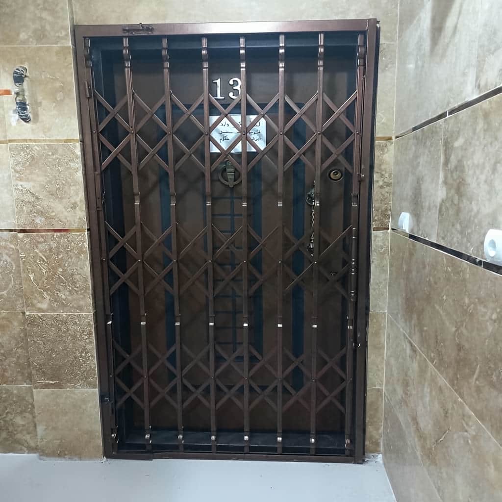 درب آکاردئونی با یراق هماهنگ با وزن سازه