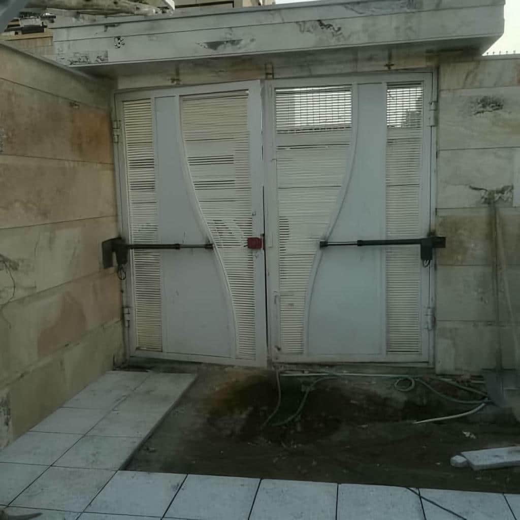 خدمات درب پارکینگ جک دار بازویی